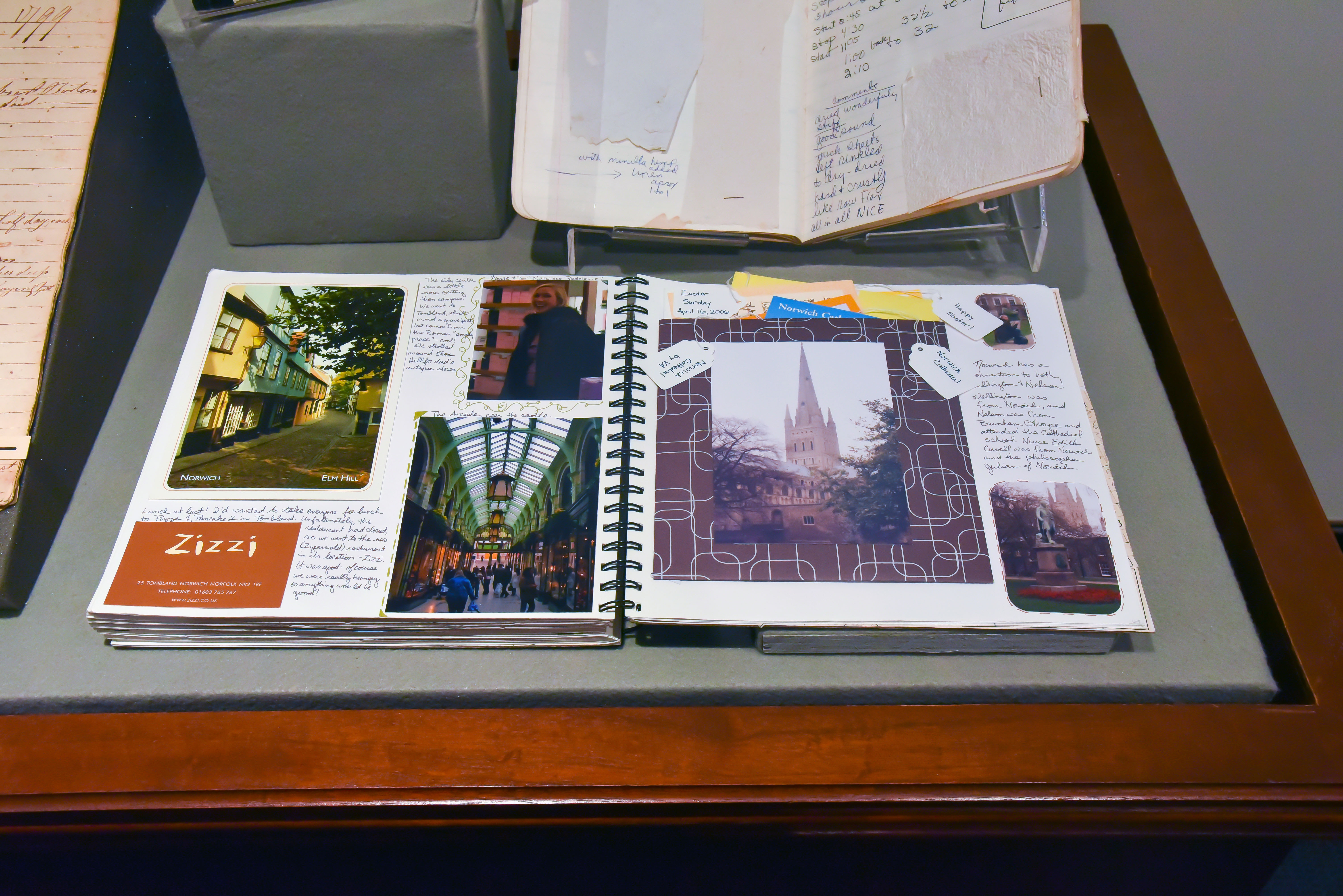Scrapbook that features photos, pockets of discovery, and memorabilia collected during a family vacation.
