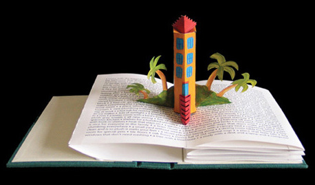Pop-up by Carol Barton Titled Home Dreams features a tower rising up above the page from the gutter of the book.
