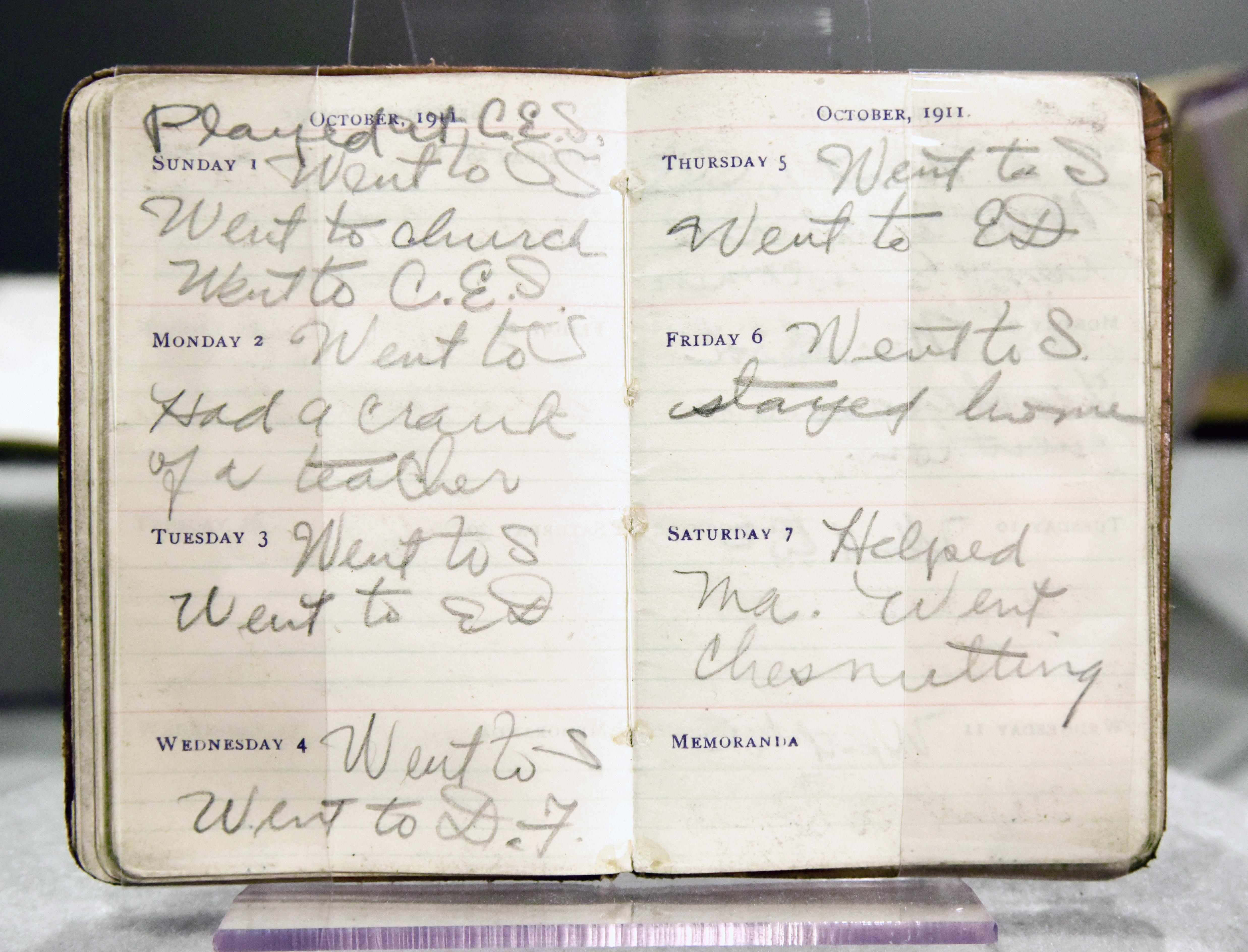 Small pocket sized datebook, open to the week of October 1st 1911, the entries are a record of Elliott's activities from Sunday to Saturday 