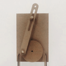 Photo of one of Hyun Joo Oh's paper mechanisms. This one is a crank and shaft made from cardboard.