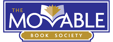 The Movable Book Society Logo is a purple rectangle with a small sanserf golden "the" in the upper left corner above a much larger white sanserf "Movable". The V at the center of the word Movable is curved to mimic an open book and just above the V are the flaps of an open page spread with a gold crown-like pop-up. Just below the purple rectangle is a elongated golden placard with the words Book Society in white letters. Both the upper rectangle and the placard are surrounded by a white line trimmed in a purple line.