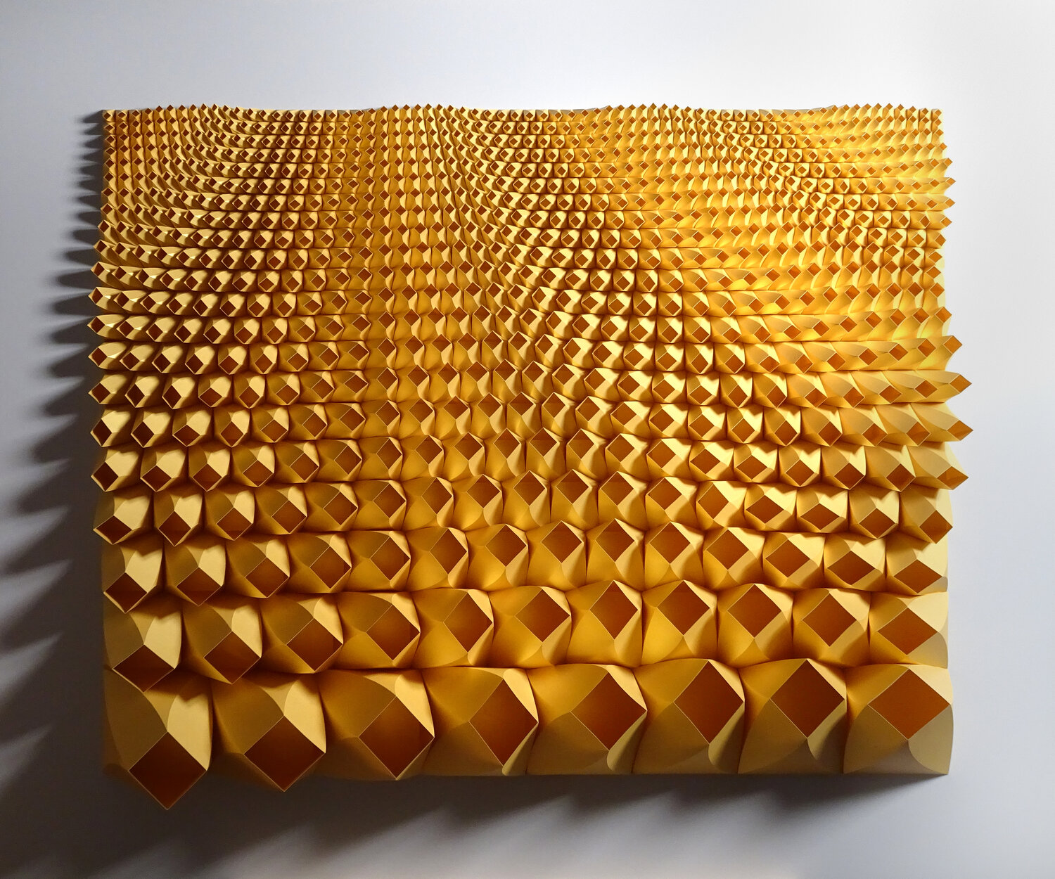 Golden Yellow modular origami by Matt Shlian titled Unholy