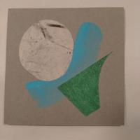 collaged image of a white circle and green grass on blue stripe, gray background.