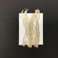 This piece is an off-white piece of handmade kozo bark with a gauze-like texture.