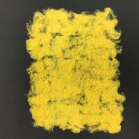 This piece is a large, yellow, rectangular sheet of handmade paper. The pulping technique used has created a “scrunched” texture, as well as leaving certain sections of the paper thinner and more translucent than the others.