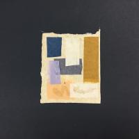 A rectangular sheet of yellowish-beige handmade paper, with somewhat raw edges. On it are a multi-colored variety of square and rectangular scraps, overlapping one another to form an abstract collage.