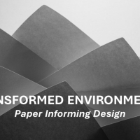 Transformed Environments: Paper Informing Design in white text over a dramatic black and white image of a stack of paper.