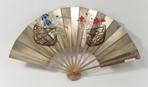 Japanese folding fan with a gold background and two baskets of flowers painted across the fan from left to right