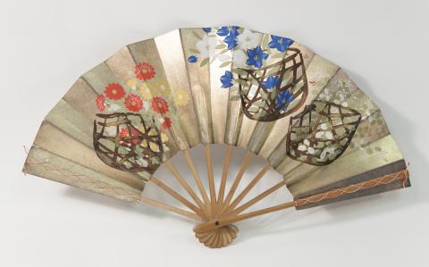 Japanese folding fan with a gold background and three baskets of flowers painted across the fan from left to right