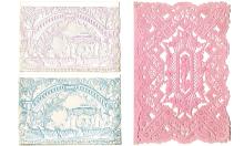 three cards. A big pink one with two smaller white ones with hints of violet and blue