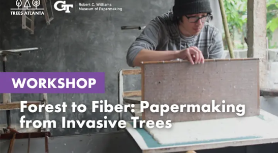 Papermaking Workshop, image of Ojascastro laying down a sheet of paper